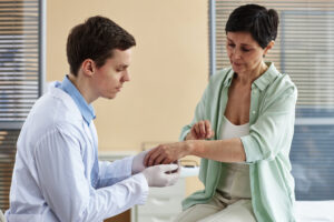 doctor discussing autoimmune therapeutics with patient